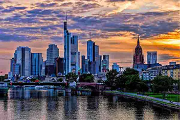 Frankfurt skyline at sunset with the Main River