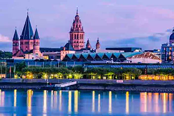 Mainz city skyline at dusk featuring the Mainz Cathedral